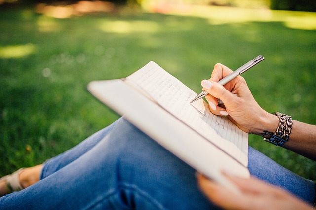 person reflecting calmly near window with journal and cup of tea, soft natural light, personal growth mindfulness